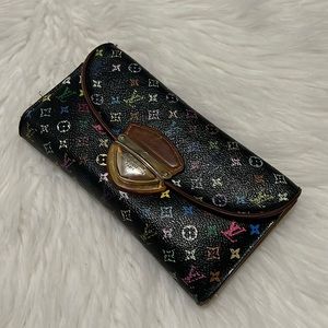 Louis Vuitton wallet, used, but still has a lot of life. 100% authentic. MI0068